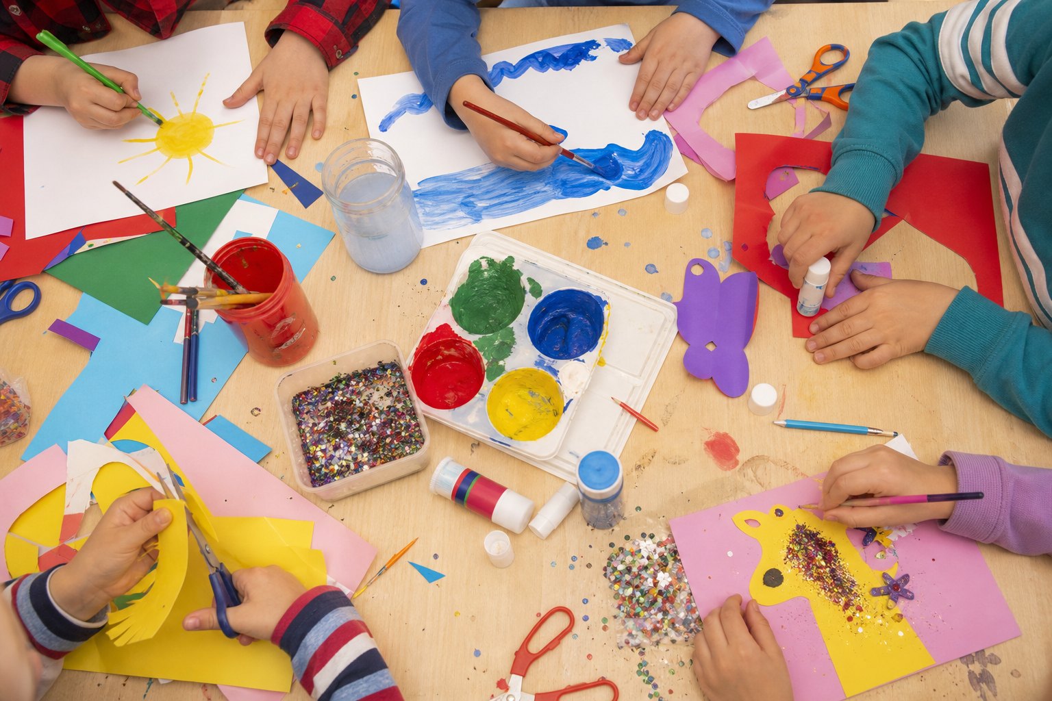 Hands busy with paints and crafts after school