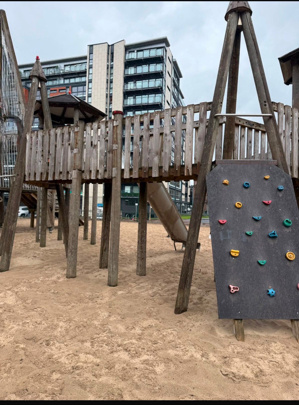 Climbing wall at an outdoor adventure playground