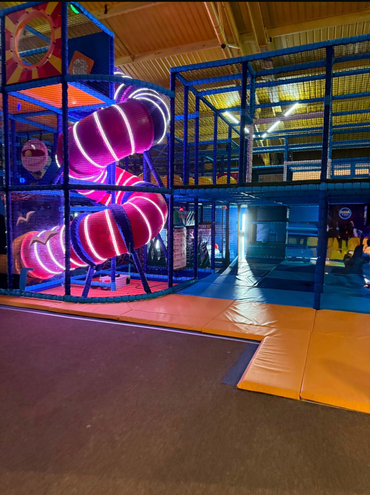 Lit spiral slide in a soft play centre