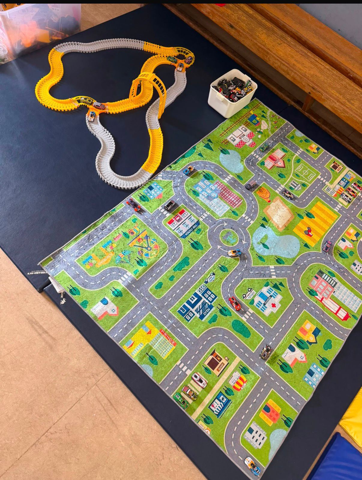 Race track and town mat in the play hall