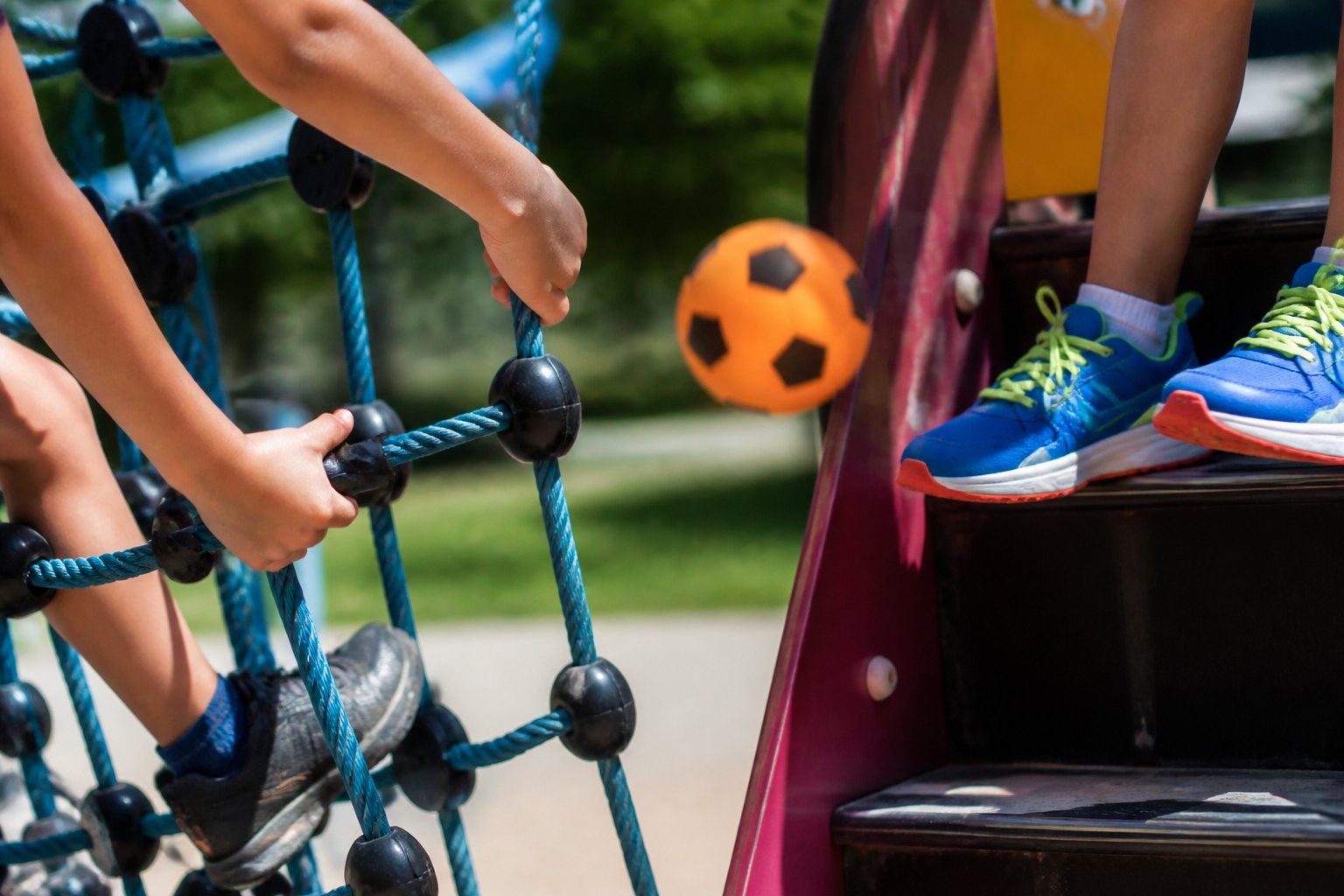 Children climbing and playing outdoors